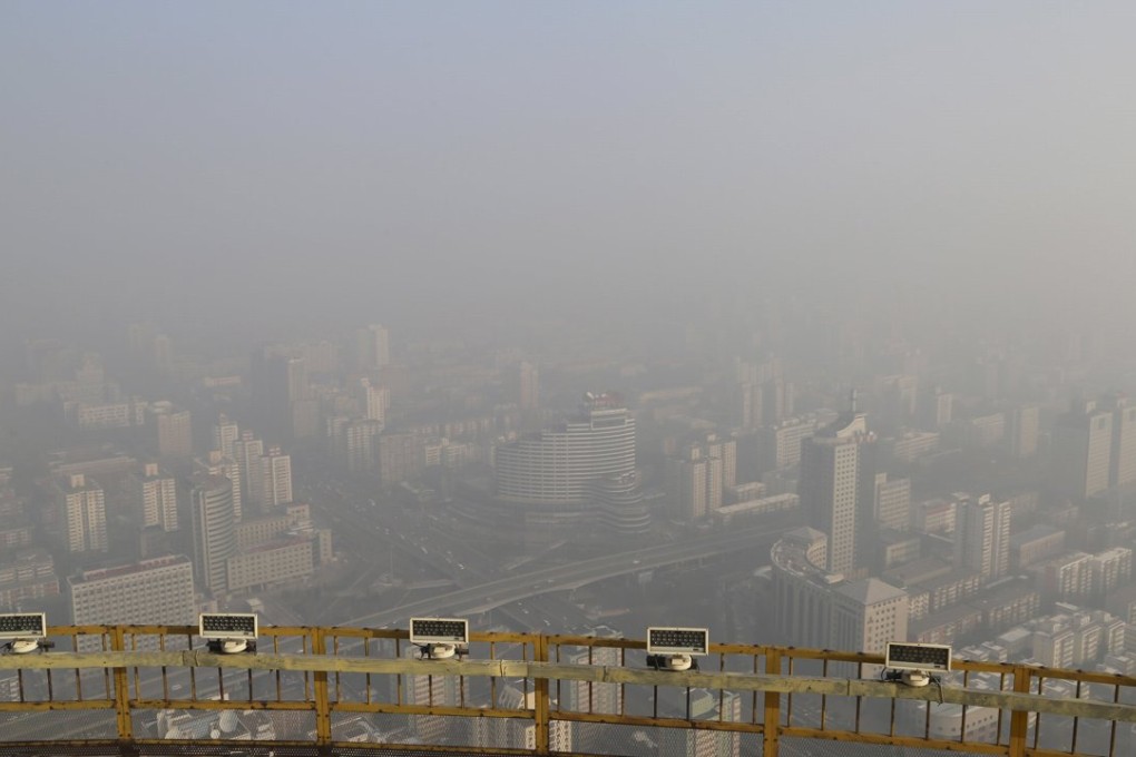 A view from the CCTV tower shows Beijing shrouded in heavy smog late last month. Photo: Reuters