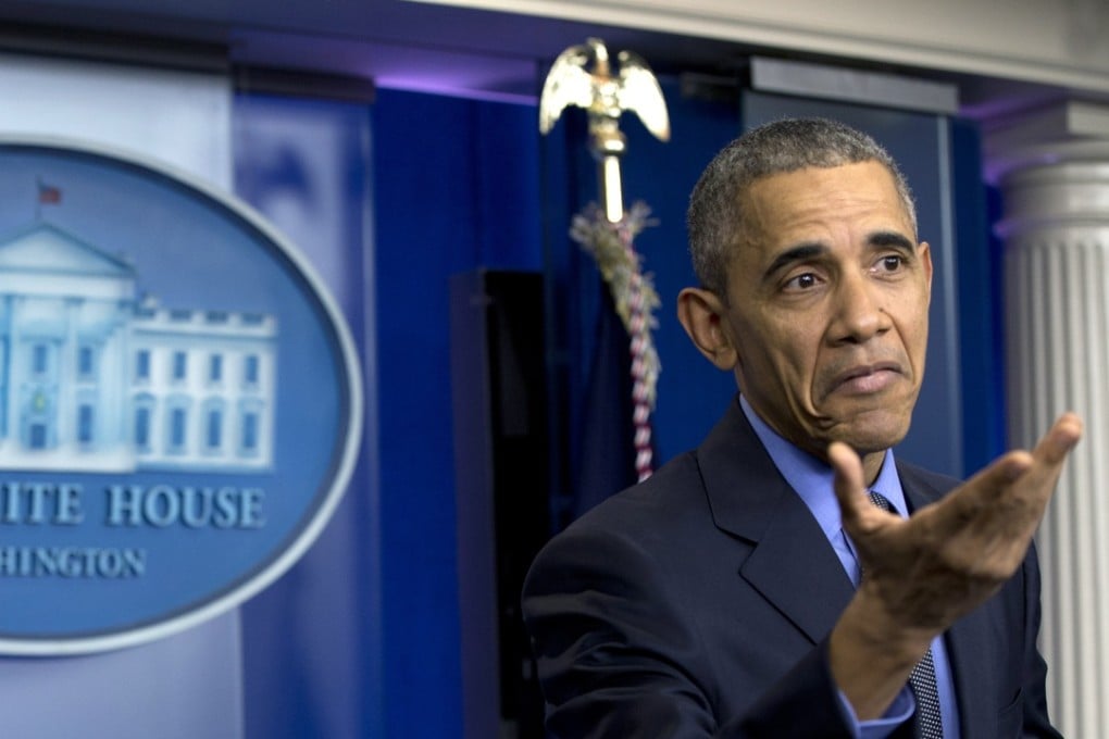 US President Barack Obama gestures as he speaks during his final briefing of the year at the White House, in Washington, December 18, 2015.