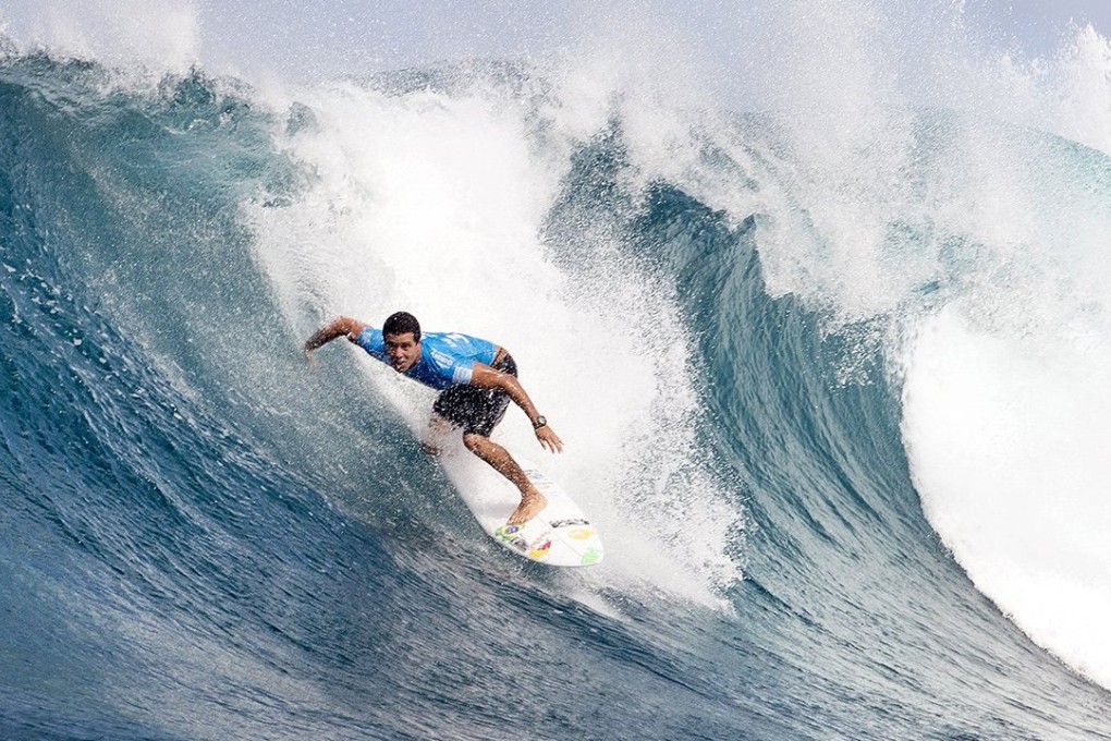 Adriano De Souza of Brazil was all class in winning the Pipe Masters and claiming the overall world surfing title. Photo: Reuters