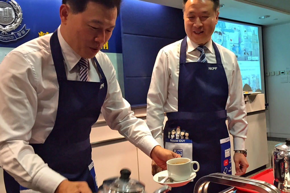”Four O’clock Hui Sir” (left) will be passing the torch to a cartoon “Milk Tea man” Kong and superintendent Joseph Au (right). Photo: Christy Leung.