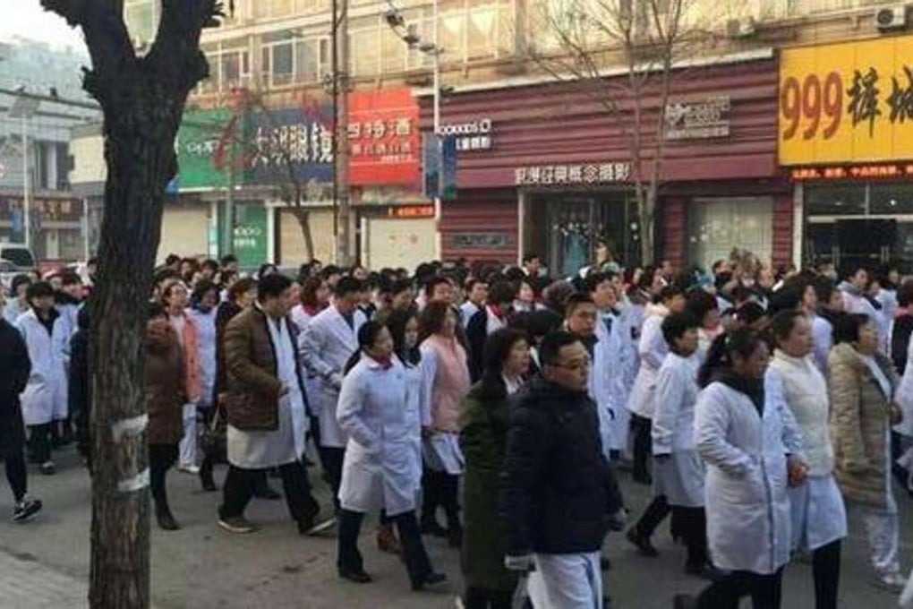 Doctors and nurses stage a protest in Yongqing county, Hebei province, on Saturday. Photo: Sina Weibo