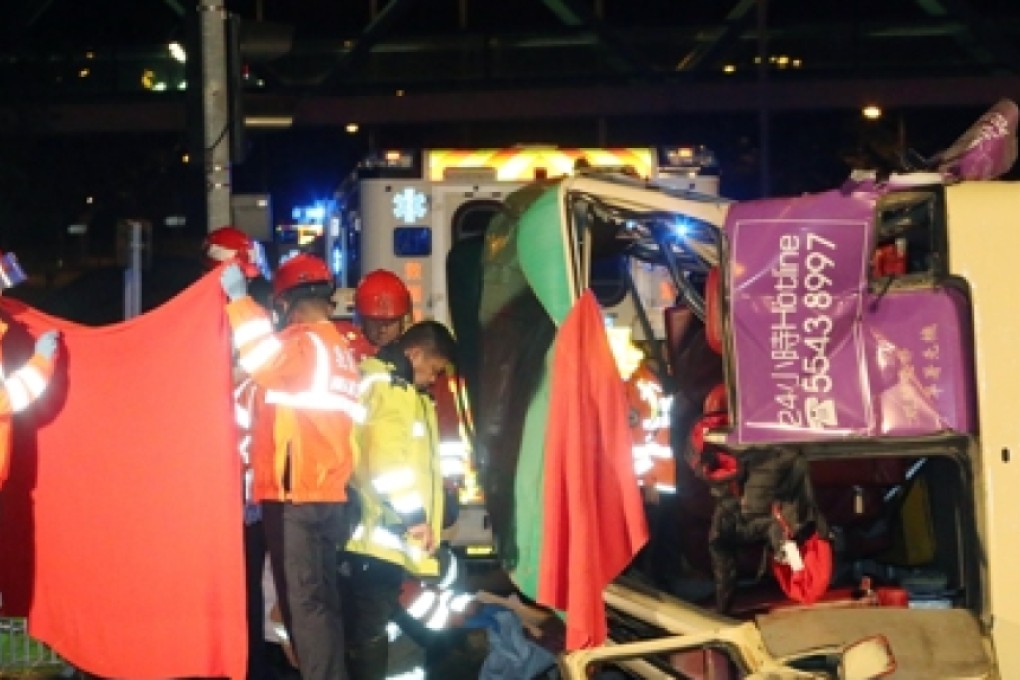 Picture shows the wreckage of the minibus involved in the accident. At least four people have been killed and at least ten others injured in a collision between a minibus and a truck in Kam Tin. 18DEC15 SCMP/ Felix Wong