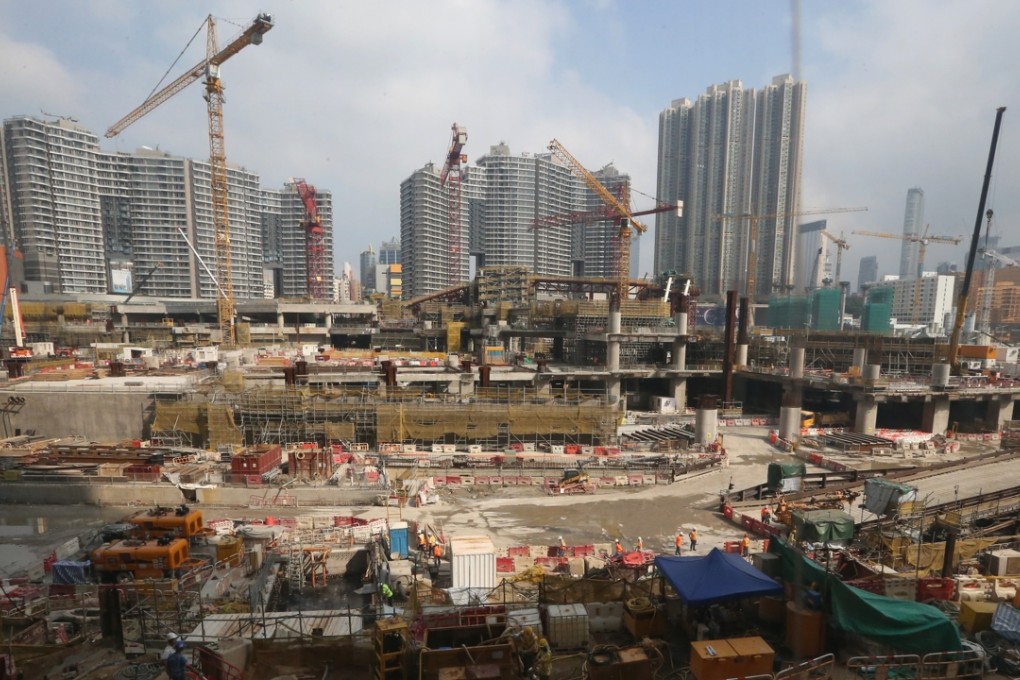 Housing projects form the backdrop to the construction of the West Kowloon Terminus of the Hong Kong section of the Express Rail Link on December 1. Photo: Felix Wong