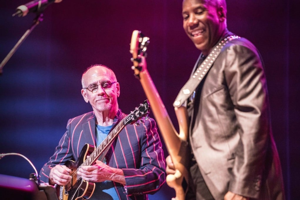 Bass guitarist Nathan East (right) performs at Baptist University with guitarist Larry Carlton.