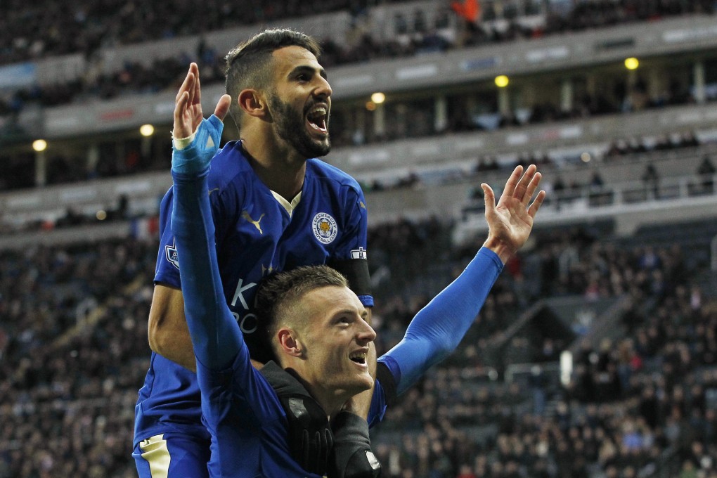 Football - Newcastle United v Leicester City - Barclays Premier League - St James' Park - 21/11/15 Jamie Vardy celebrates with Riyad Mahrez after scoring the first goal for Leicester City to equal the record for scoring in consecutive Premier League games Action Images via Reuters / Craig Brough Livepic EDITORIAL USE ONLY. No use with unauthorized audio, video, data, fixture lists, club/league logos or "live" services. Online in-match use limited to 45 images, no video emulation. No use in betting, games or single club/league/player publications. Please contact your account representative for further details.