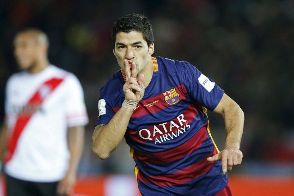 Barcelona's Luis Suarez celebrates scoring their third goal. Photo: Reuters