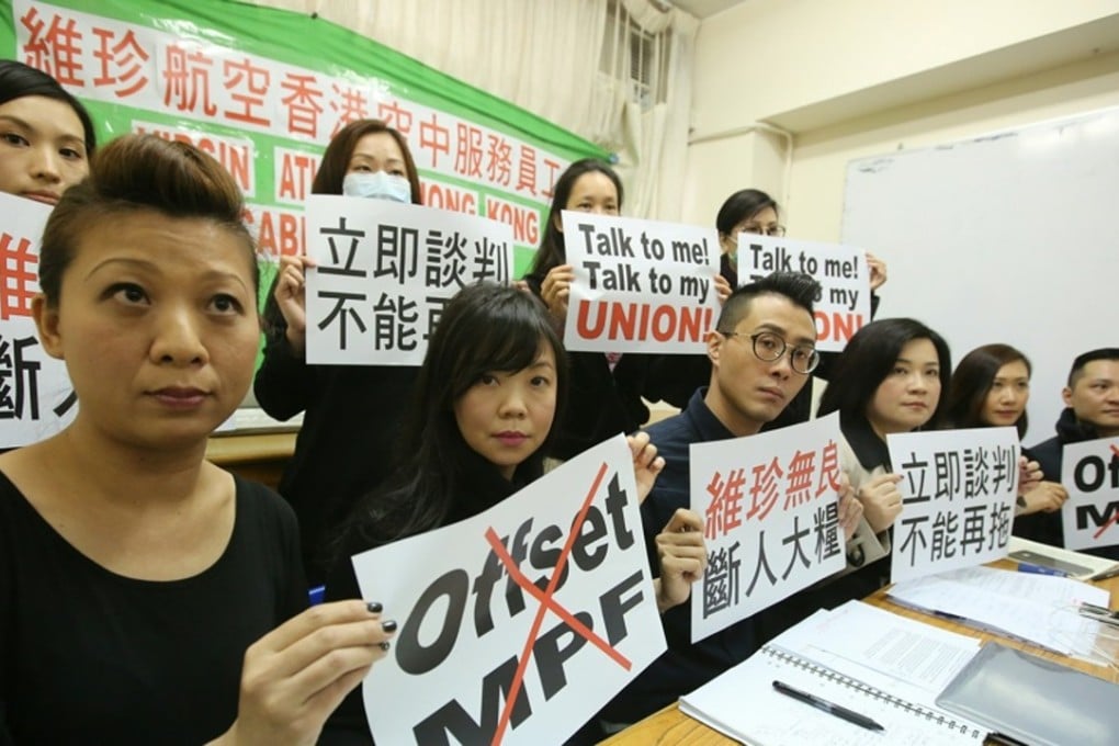 Virgin Airline cabin crew in Hong Kong who are affected by the lay-offs protest against MPF offset mechanism yesterday. Photo: Edward Wong