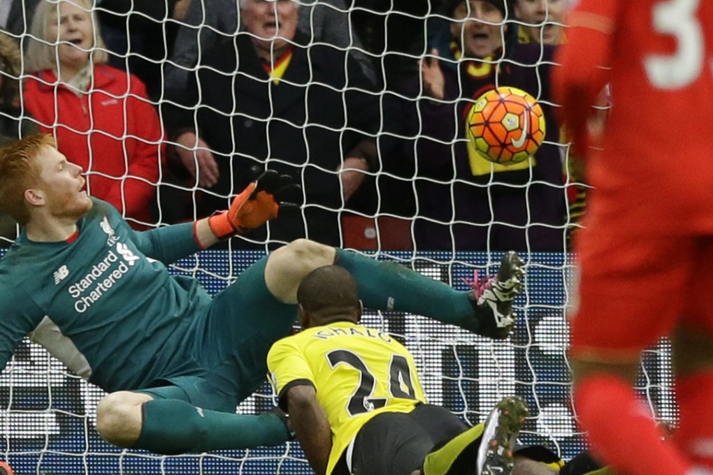 Watford's Odion Ighalo scores his side's third goal past Liverpool’s hapless goalkeeper Adam Bogdan during their English Premier League match at Vicarage Road. Watford won 3-0. Photos: AP