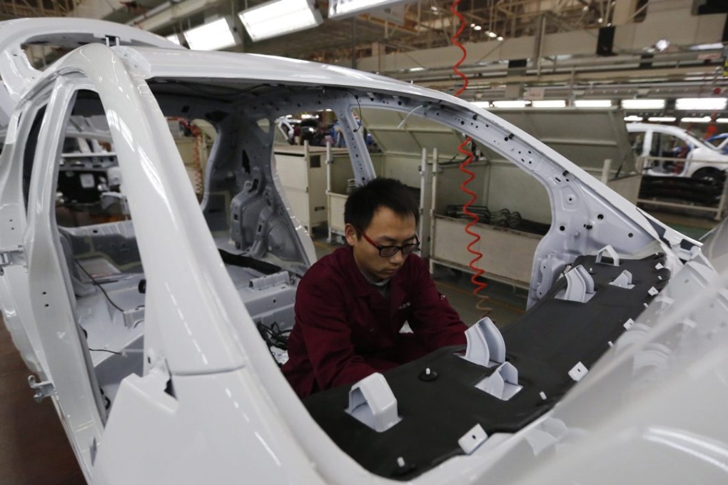 Investment growth will slow to 9 per cent in 2016 as investment in manufacturing falls, an NDRC think tank has warned. Photo: EPA