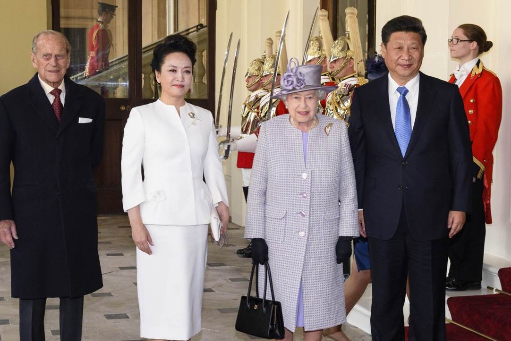 (From left) Britain's Prince Philip stands alongside China's First Lady, Peng Liyuan, Britain's Queen Elizabeth and China's President Xi Jinping during the mainland leader’s state visit to Britain in October. Photo: AFP