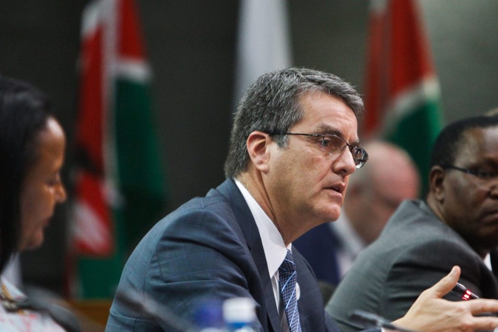 World Trade Organization Director-General Roberto Azevedo (C), address journalists during a closing press conference at its 10th ministerial conference in Kenya. Photo: EPA