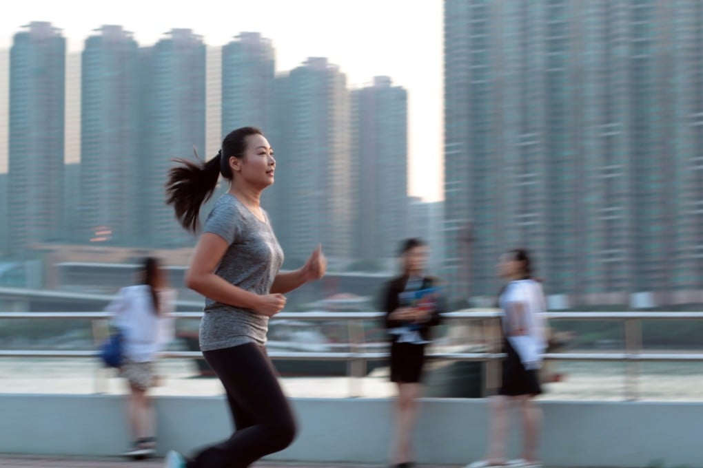 Vivian Siu runs in Tsuen Wan Park. She says she would exercise more if facilities were nearer her home.