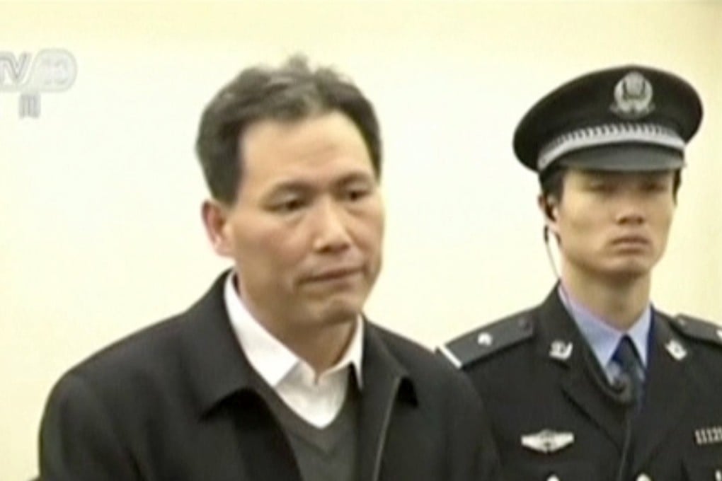 China's rights lawyer Pu Zhiqiang (left) speaks at a court session in Beijing on December 14. Photo: CCTV via Reuters