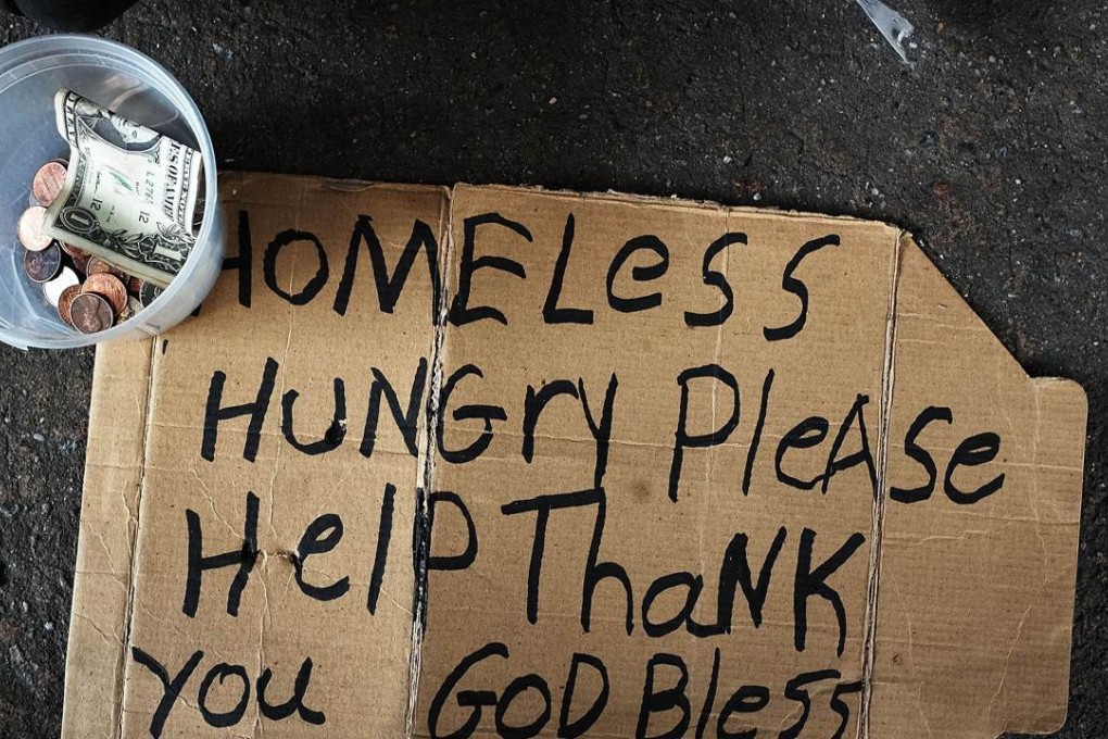 A homeless man's sign. In the past five years New York's homeless population has ballooned from approximately 38,000 in October of 2010 to over 59,500 in October of 2015, according to Coalition for the Homeless. Photo: AFP