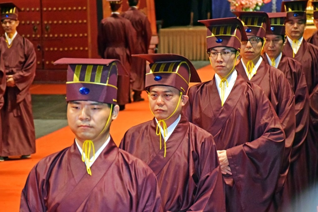 More than 8,000 Taoist followers participated in this year’s Ching Ming Festival ancestral worship ritual in Asia World-Expo in April. Photo: Franke Tsang
