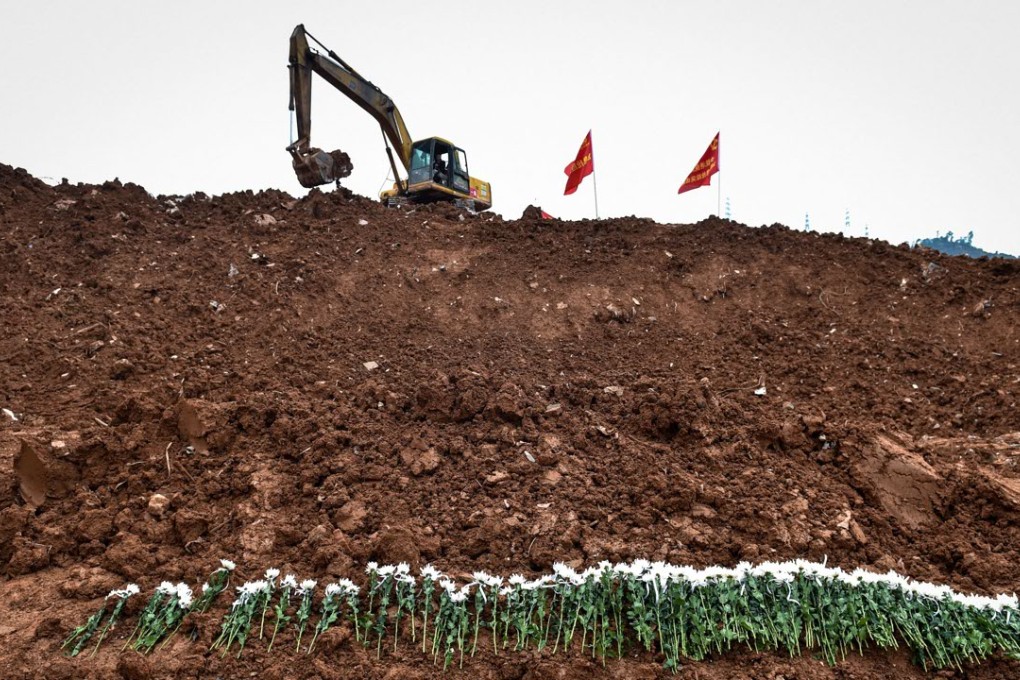 Rescuers laid wreaths for victims of last week’s landslide site an industrial park in Shenzhen. So far only one survivor has been pulled from the debris, while 75 are missing. Photo: Xinhua