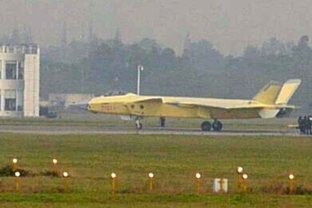 A photo that appears to show China’s J-20 stealth fighter, still coated in yellowish paint typically used before radar absoprbing materials are applied. Photo: Xinhua