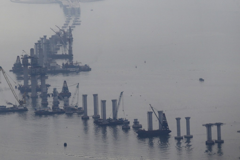 Leung Chun-ying has blamed judicial reviews for the delay in some infrastructure projects, including the proposed bridge to Macau and Zhuhai. Photo: Felix Wong