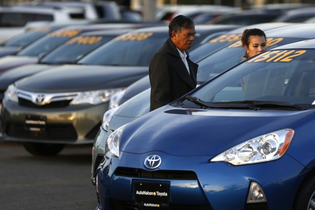People look at cars for sale in Cerritos, California. Photo: Reuters