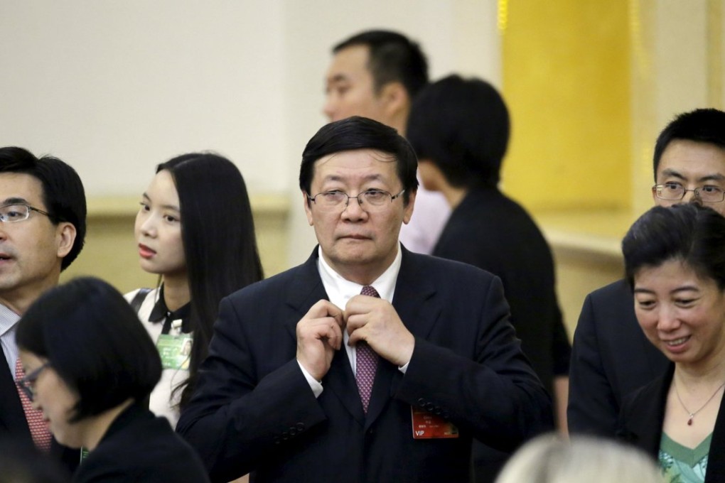 China's Finance Minister Lou Jiwei attends a signing ceremony of articles of agreement for the Asian Infrastructure Investment Bank at the Great Hall of the People in June 29. Photo: Reuters