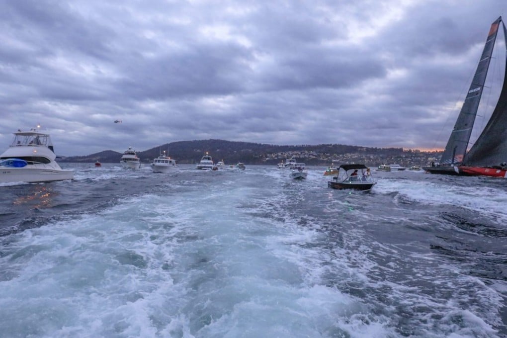 American super maxi Comanche closes in on line honours in the Sydney to Hobart yacht race. Photos: EPA