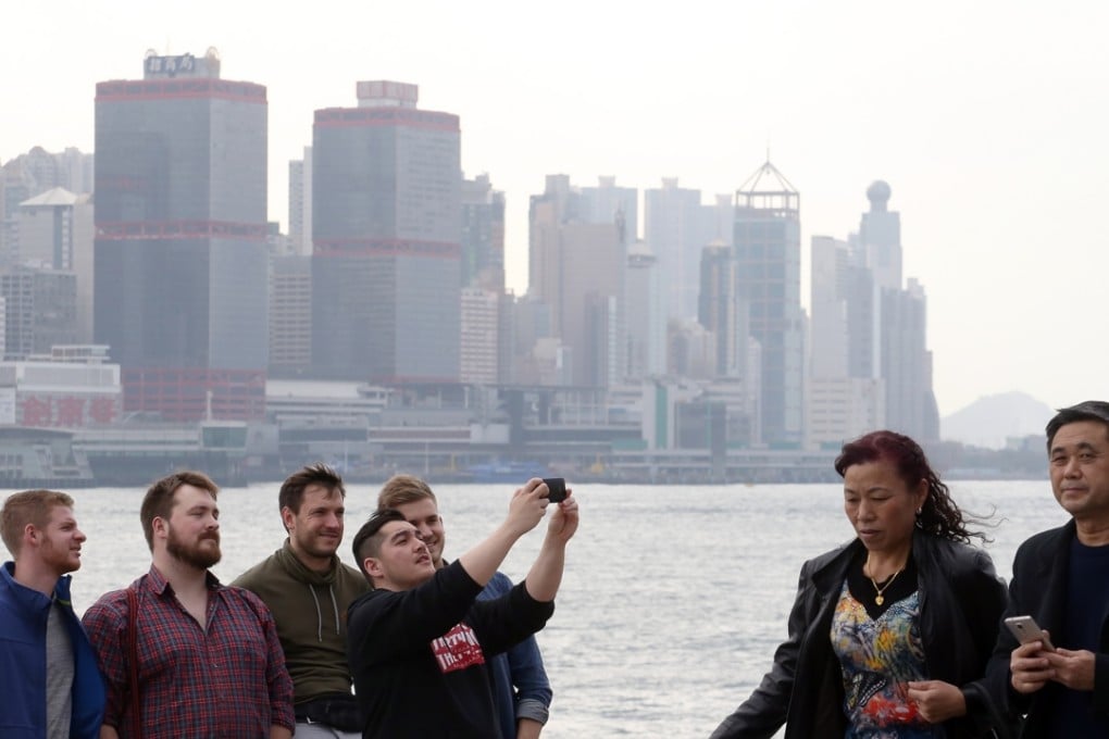 The number of overseas tourists was up and experts said individual visitors had a greater spending power than tour groups. Photo: Felix Wong