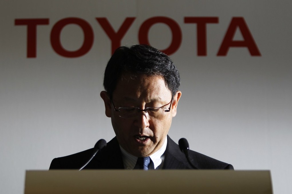 Toyota Motor chief executive Akio Toyoda addresses a news conference in Tokyo. Photo: Reuters