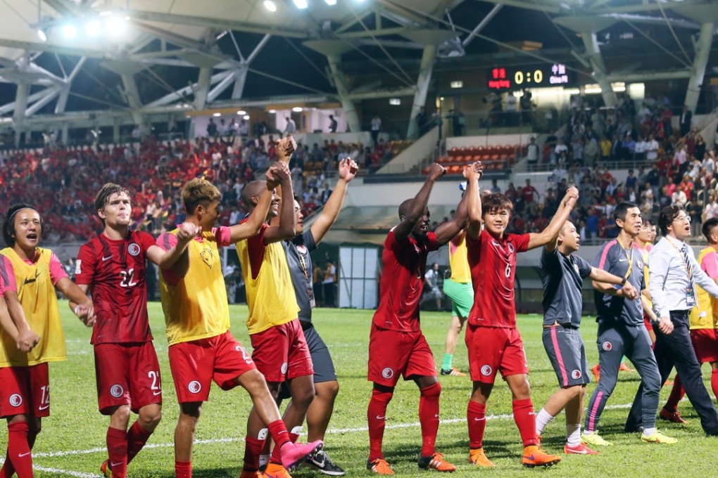 Hong Kong teenager Tan Chun-lok (fourth from left) salutes the crowd after the team’s World Cup qualifier against China at Mong Kok Stadium. Photo: K.Y. Cheng