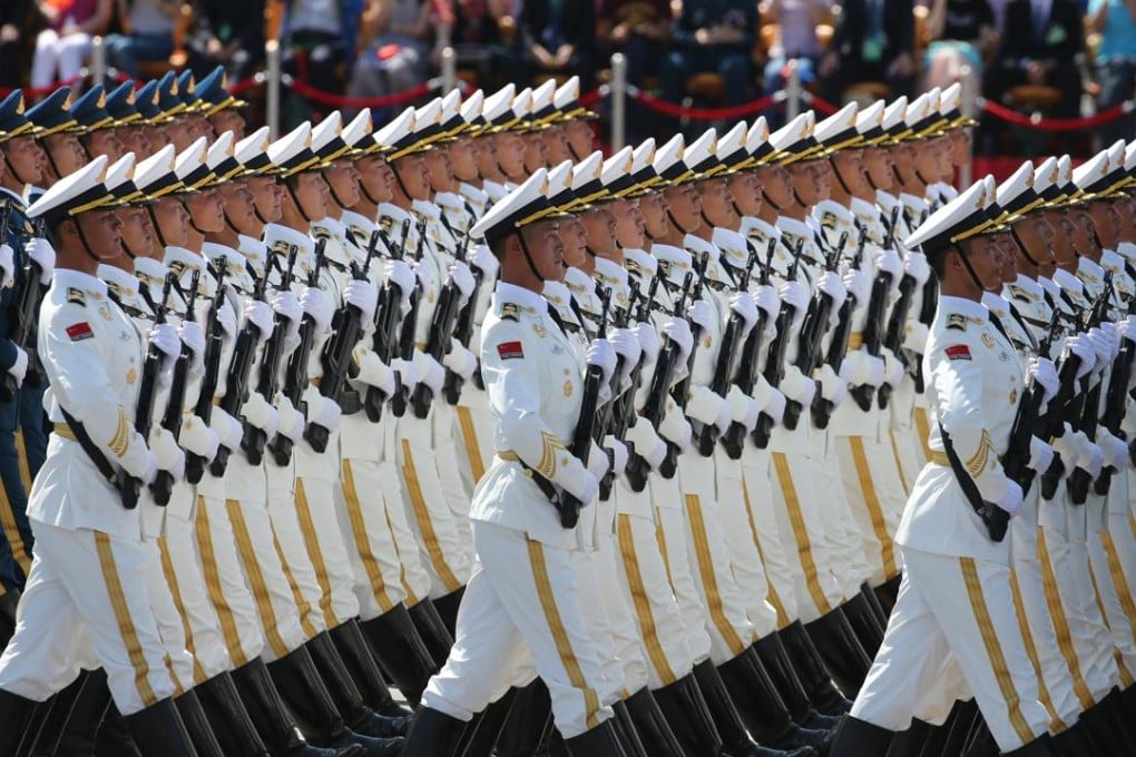 Members of the People's Liberation Army take part in the parade in Beijing in September. China’s military is in the midst of a massive overhaul, aimed at rooting out corruption and making it a more efficient, modern fighting force. Photo: Xinhua
