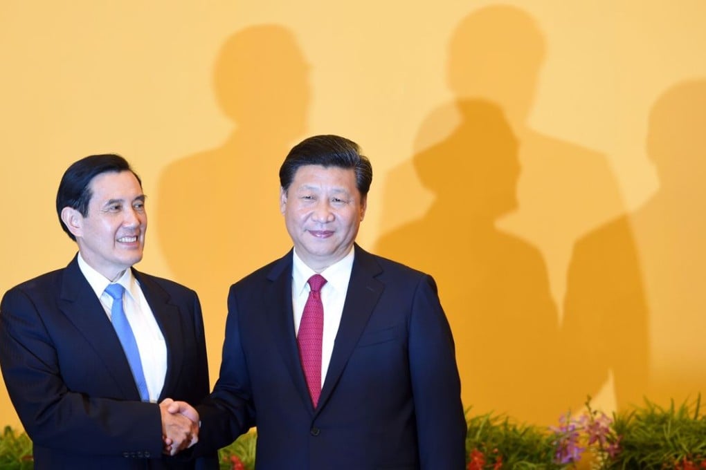 The hotline was agreed at the summit meeting in Singapore last month between President Ma Ying-jeou of Taiwan, left, and mainland head of state Xi Jinping . Photo: AFP
