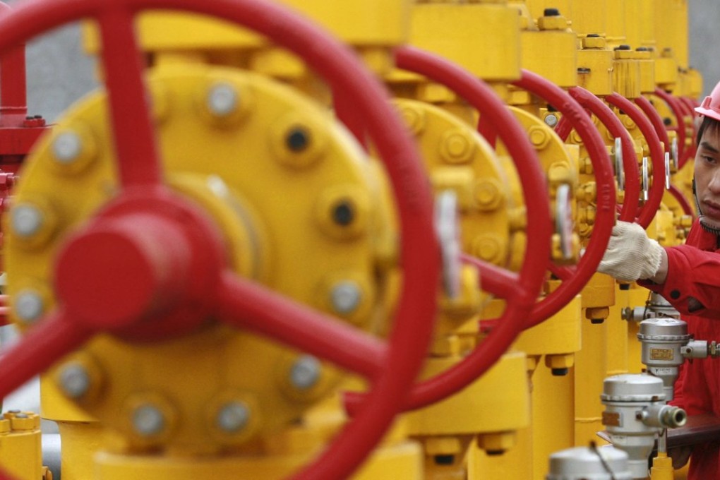 A worker checks pipelines at a PetroChina oil field on the outskirts of Guang'an, Sichuan province in China. The company dominates the oil and gas sector in the country and will be most affected by reforms in 2016. Photo: Reuters