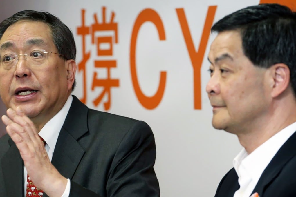 Li, seen here with Leung Chun-ying in 2012, has close political ties to the city’s top official. Photo: Felix Wong