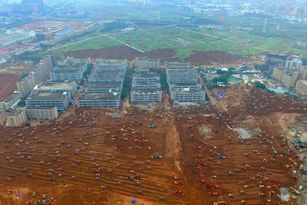 Heavy construction equipment at the landslide site has steadily increased in number as the search and rescue effort ramps up. Photo: Xinhua