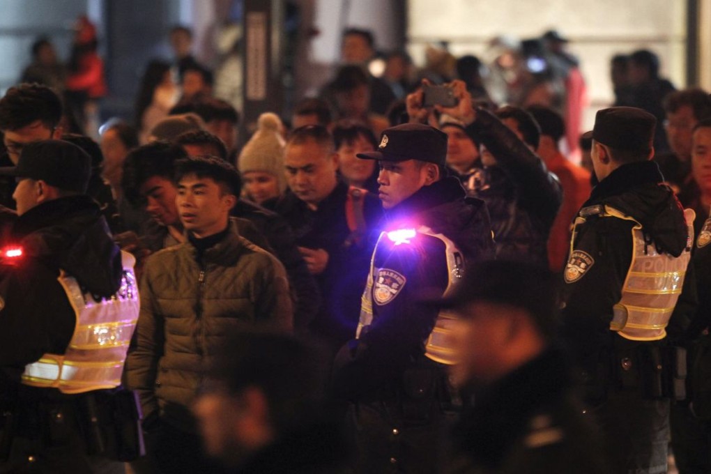 Security personnel deployed on the Bund on New Year’s Eve. Photo: AFP