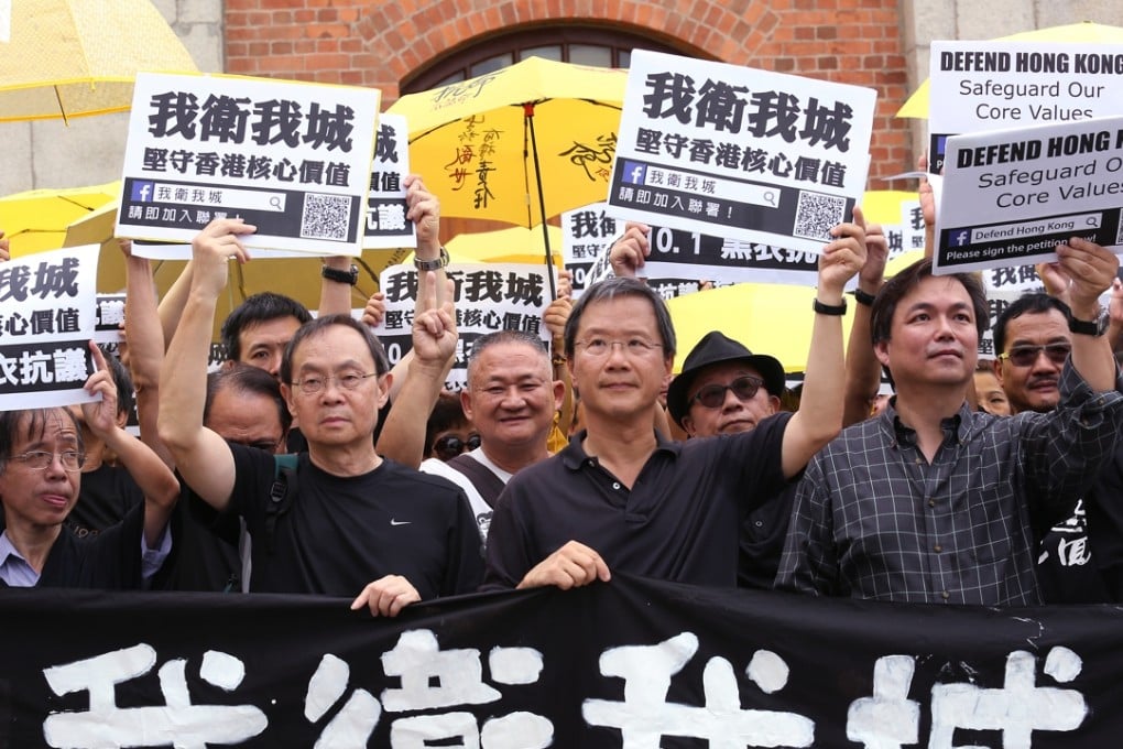 A group of professionals and Occupy supporters demonstrate in support of Hong Kong’s core values. Photo: Nora Tam