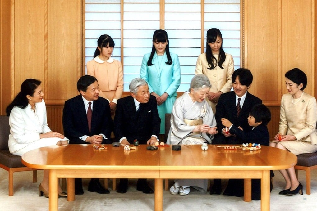 The Japanese imperial family in a portrait released on New Year’s Day. Clockwise from Emperor Akihito (front, 3rd left); Crown Prince Naruhito, his wife Crown Princess Masako, and their daughter Princess Aiko; Princess Mako and sister Princess Kako, their mother Princess Kiko, her son Prince Hisahito, and husband Prince Akishino; and Empress Michiko, wife of the emperor. Photo: Reuters