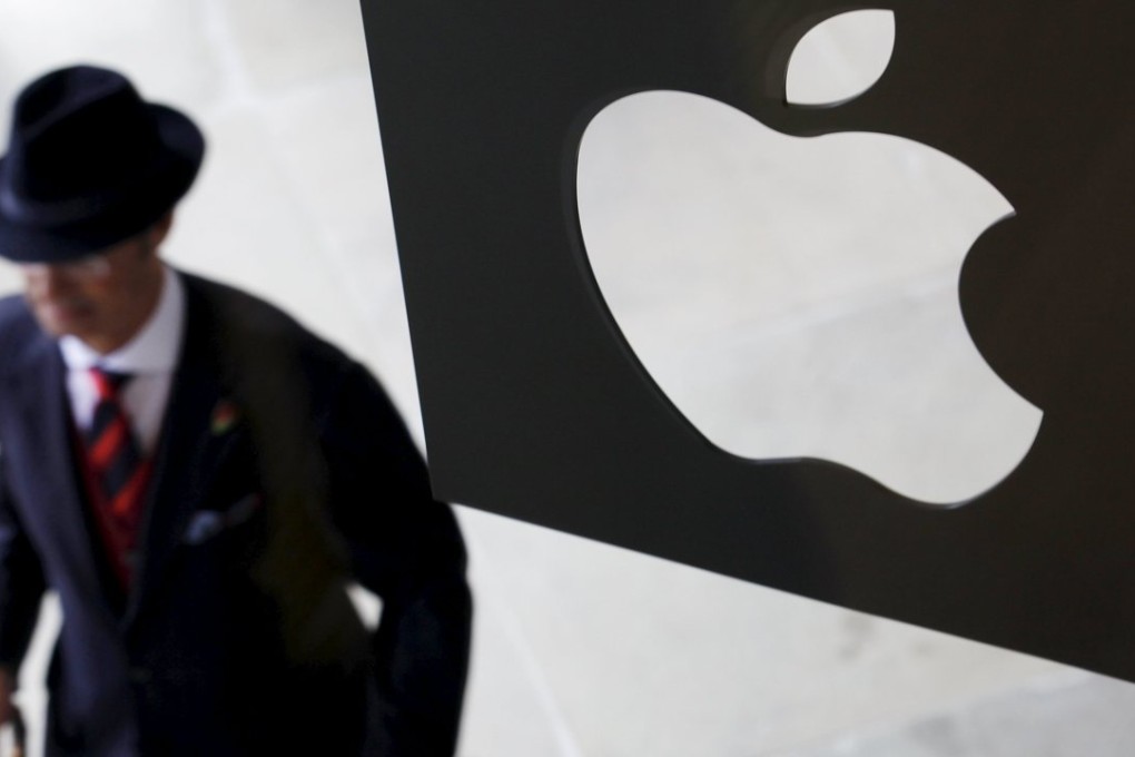 A customer enters the new Apple store in London as the iconic iPhone maker is now the world’s biggest company and has branched out in other lines of business like music and mobile payments. Photo: Reuters
