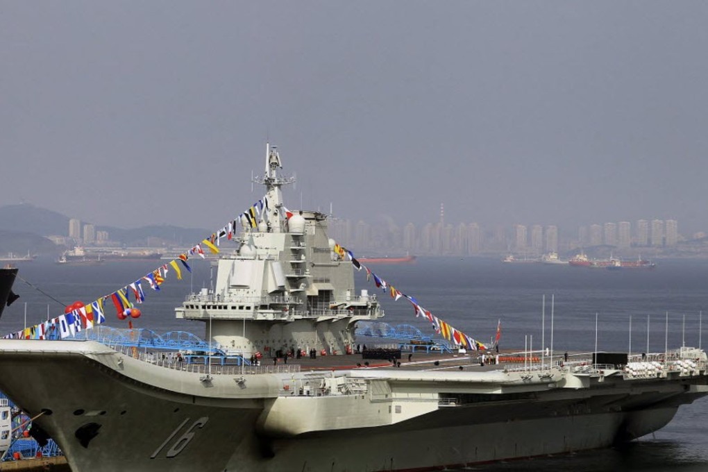 China’s first aircraft carrier, with hull number ‘16’ and named Liaoning, is seen in the shipyard in Dalian, northeast China, in September 2012. Photo: EPA