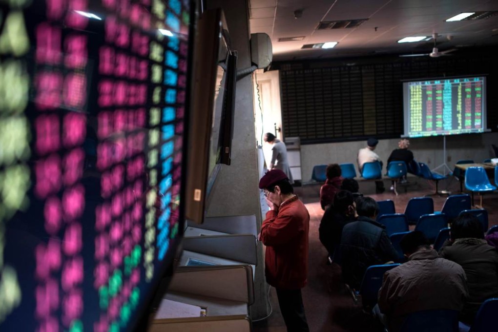 The mainland’s new “circuit breaker” will see the trading of stocks, index futures and options suspended for 15 minutes when the CSI 300 Index fluctuates by 5 per cent. Photo: AFP