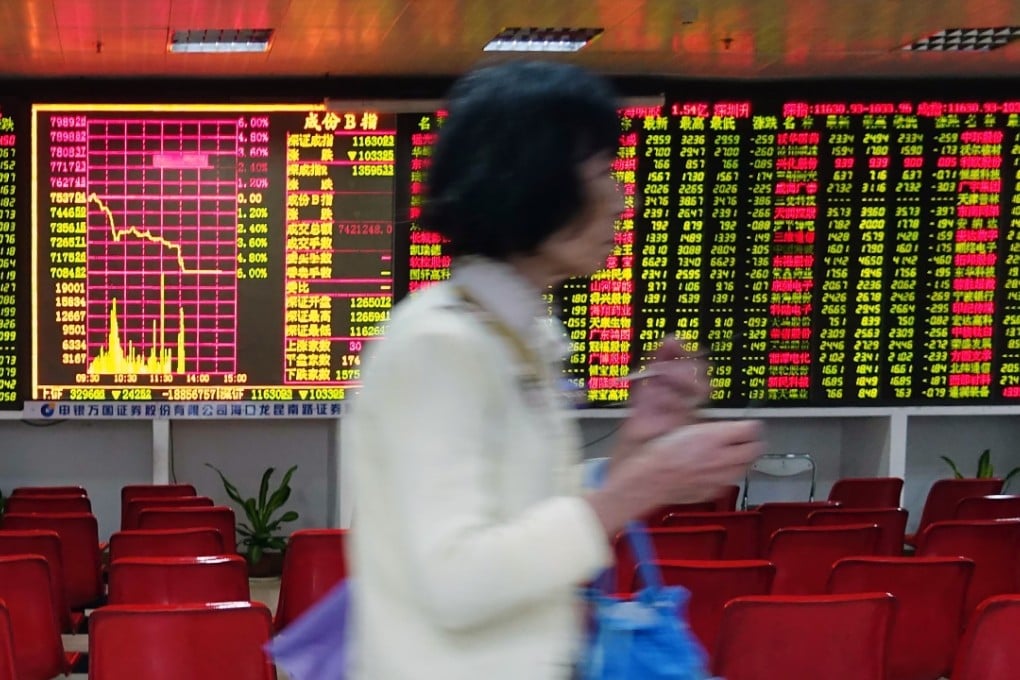A trading hall is left empty after trading closes at a securities firm in China. Photo: Xinhua
