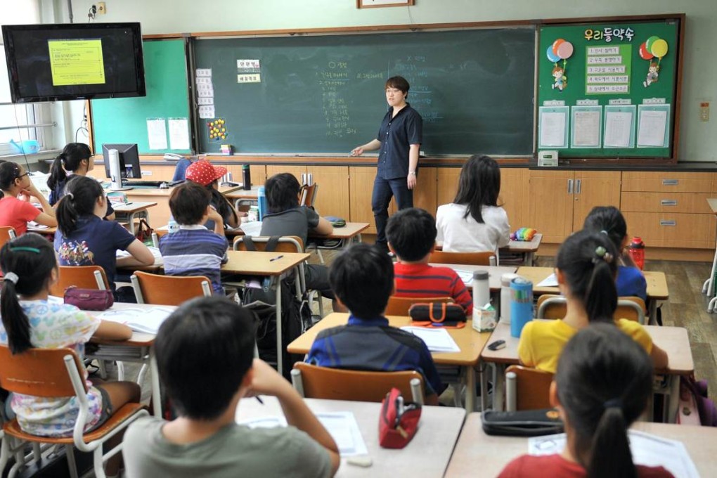 South Korean children during a special class on smartphone addiction at an elementary school in Seongnam, south of Seoul. Photo: AFP
