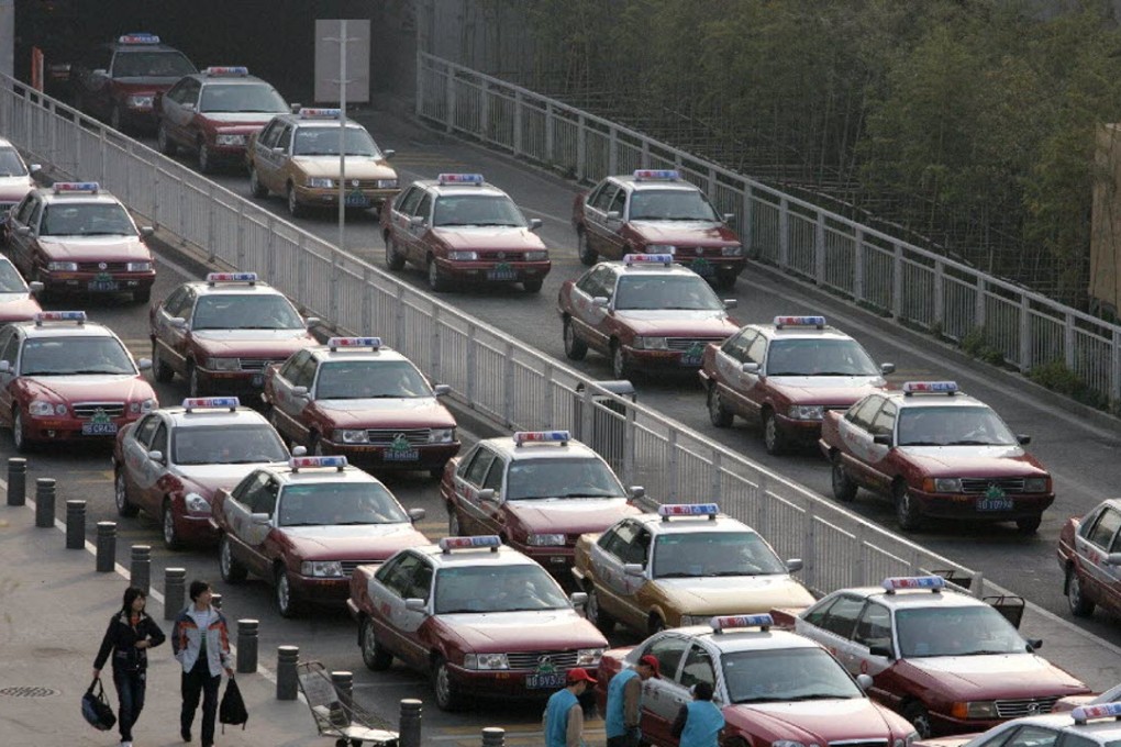 Taxi’s queue up at Luohu Commercial City in Shenzhen. File photo