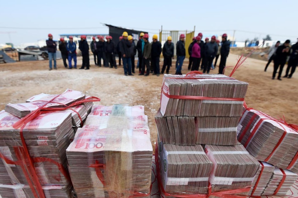 Analyst are in near universal agreement China’s yuan will undergo further depreciation in 2016: Photo: Xinhua