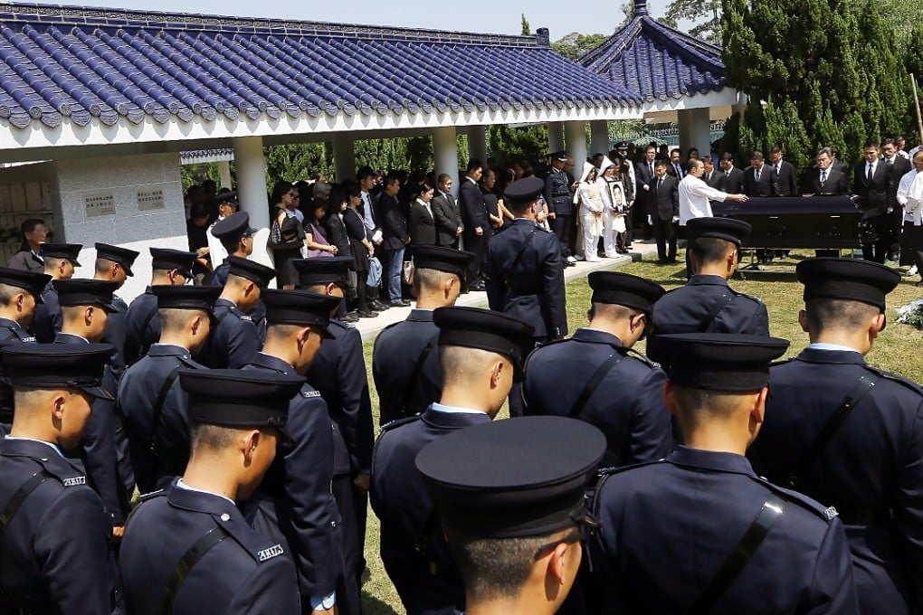 A memorial service is held for a deceased police officer at Gallant Garden. Photo: Sam Tsang