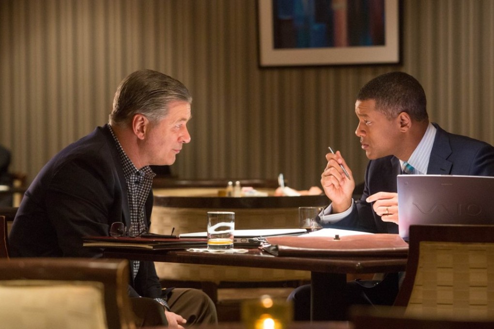 Will Smith and Alec Baldwin in a scene from Concussion.