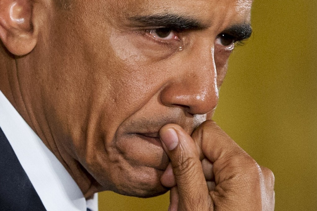 Tears well up in US President Barack Obama's eye as he speaks about the youngest victims of the Sandy Hook shootings on Tuesday at a White House press conference. Photo: AP
