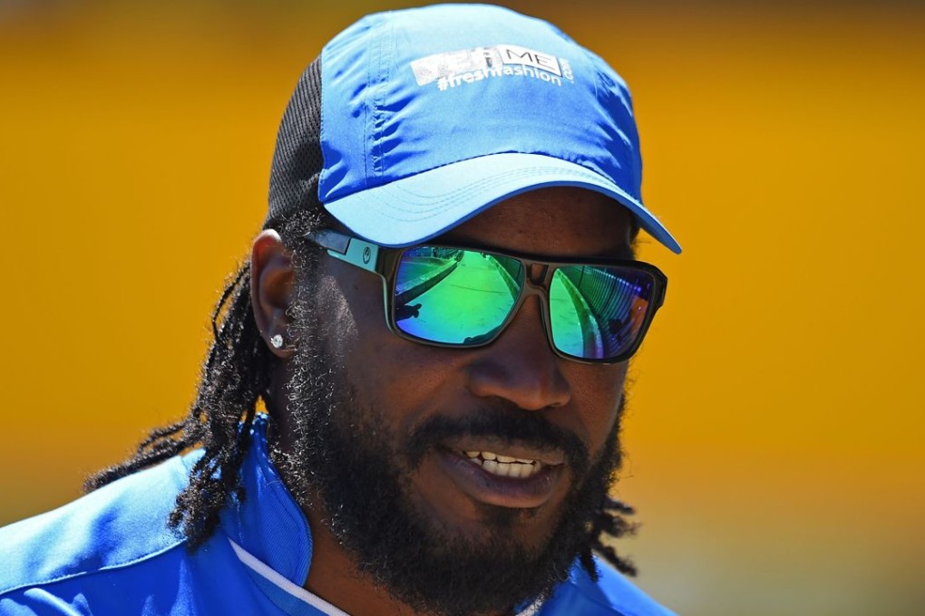 Chris Gayle’s management has announced it is pursuing court action against Fairfax Media over allegations that he indecently exposed himself to a woman at last year’s World Cup. Photo: AFP