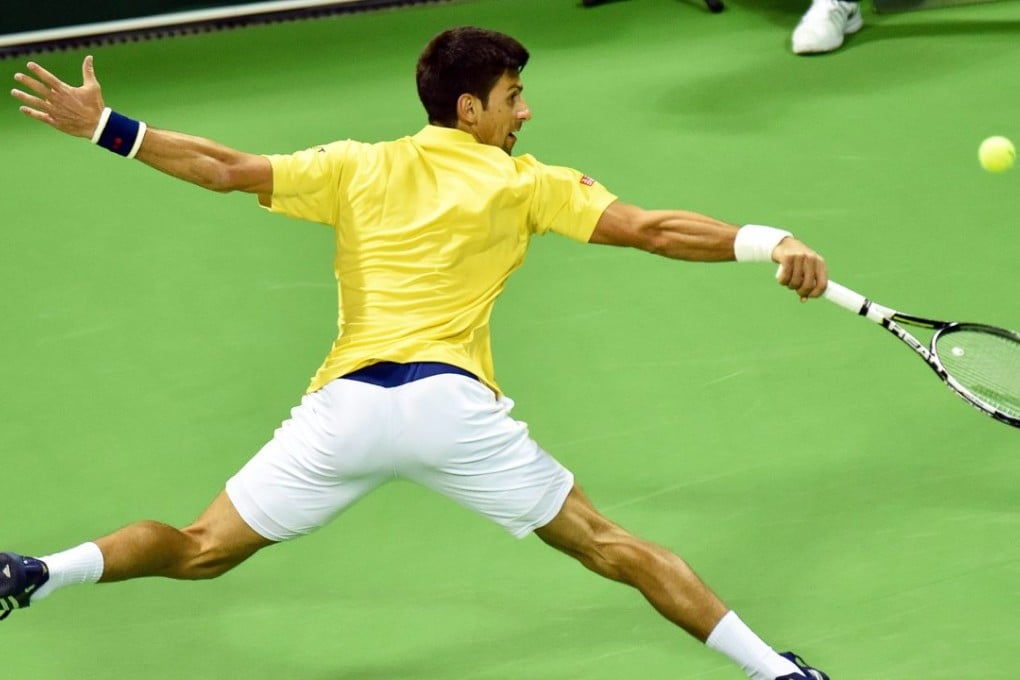 Novak Djokovic of Serbia eased into the third round in straight sets in Doha. Photo: EPA