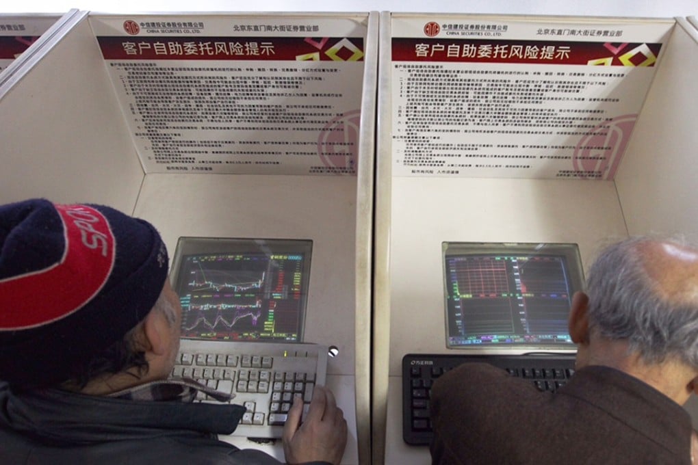 Share holders monitor stock prices at a brokerage house in Beijing. The circuit breaker mechanism was announced suspended last night after it caused stock plunge. Photo: Simon Song