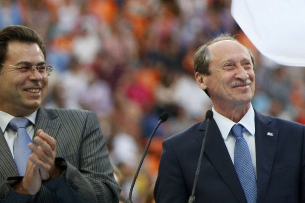 Disgraced former Russian Athletics Federation president Valentin Balakhnichev (right) was all smiles when he joined Moscow deputy mayor Alexander Gorbenkov at the closing ceremony of the World Athletics Championships in Moscow in August 2013. Balakhnichev has now been banned for life for his role in extortion and doping cover-ups. Photo: AP